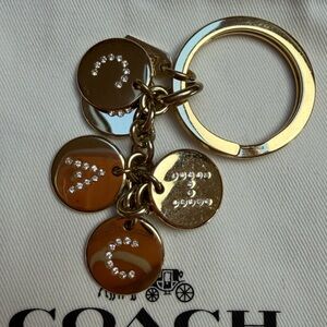 COACH Rare Gold Letters Keychain Swarovski Crystals F69939 & Dust Bag